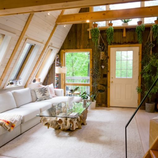 white sofa set near window