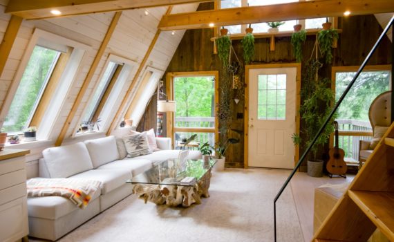 white sofa set near window